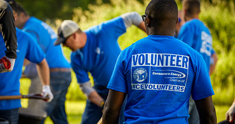 Consumers energy volunteers planting trees 